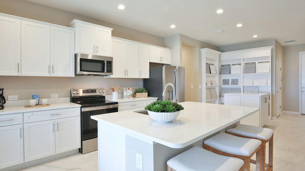 Furnished interior view inside a new home in Palm Grove Real Estate and Homes for Sale in Lakewood Ranch, FL - Neal Communities, Lakewood Ranch (Image 12).
