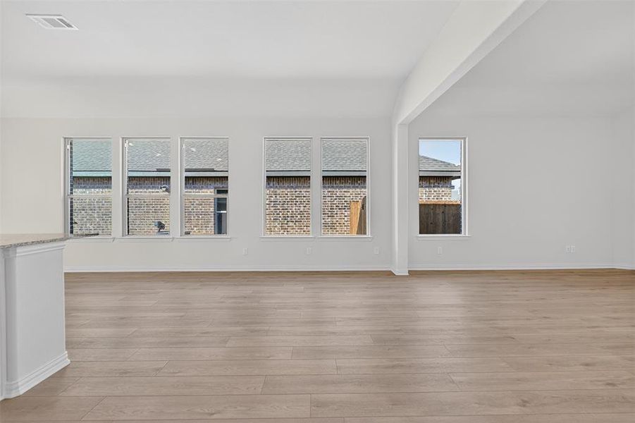 Empty room with light wood-style flooring