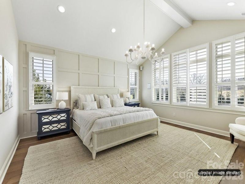 Primary Bedroom with vaulted ceiling
