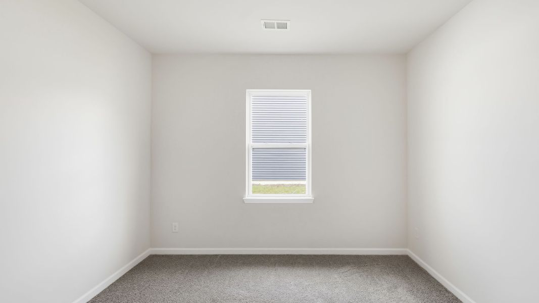 Spacious, unfurnished interior of a new home in Tap Root Farms, Fletcher (Image 19).