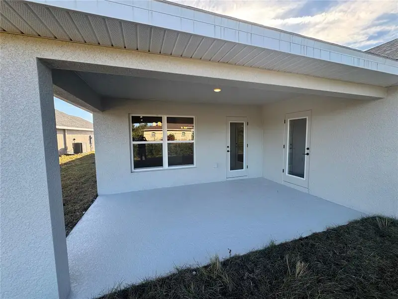Exterior details and patio area of a home in Watercress Cove, North Port (Image 1). Exterior details and patio area of a home in Watercress Cove, North Port (Image 1).