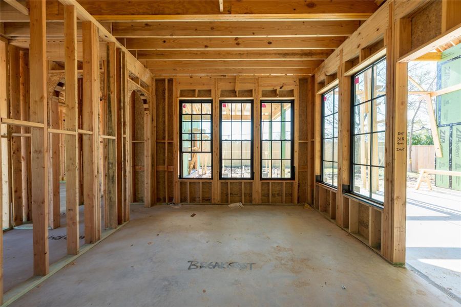 Framed by expansive windows, this sunlit corner is destined to become a favorite gathering place where mornings begin and conversations linger.