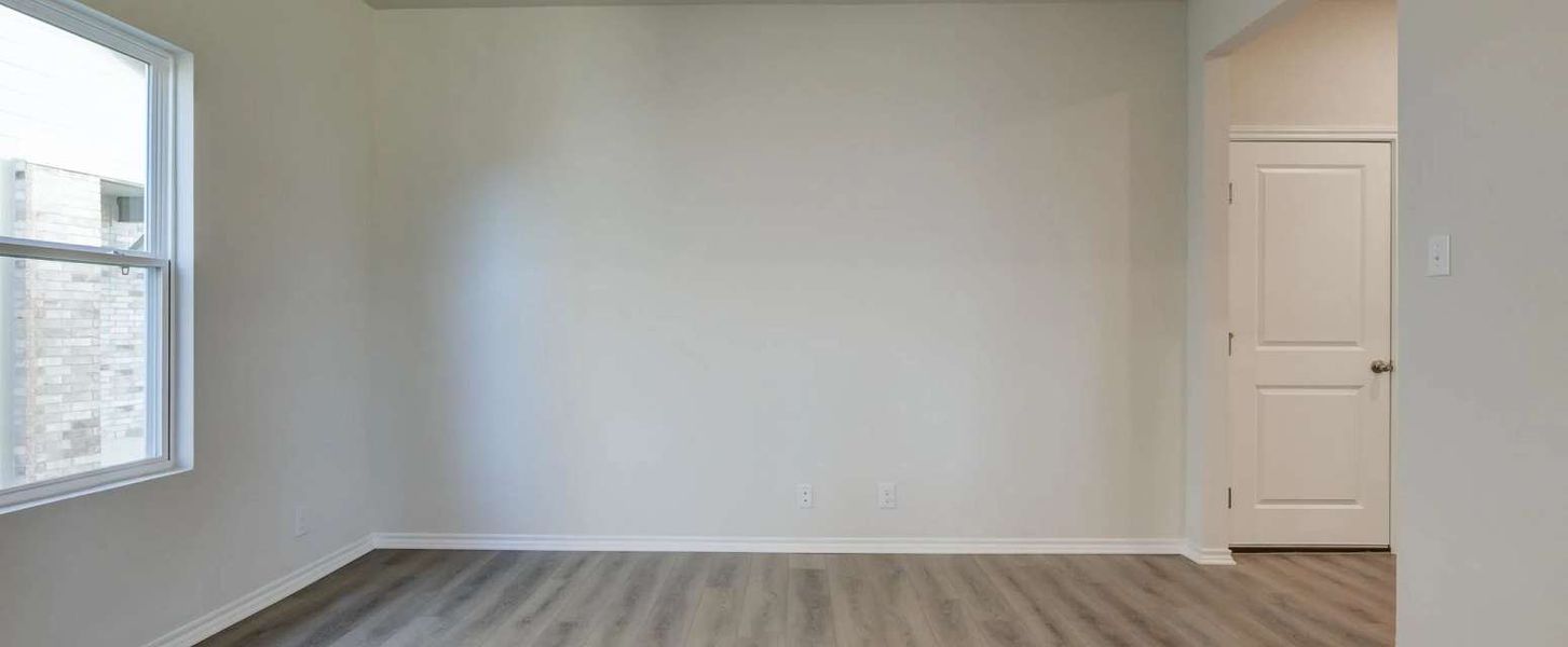 Representative unfurnished interior of a home built from the Placid by Ashton Woods in Hennersby Hollow, San Antonio (Image 13).