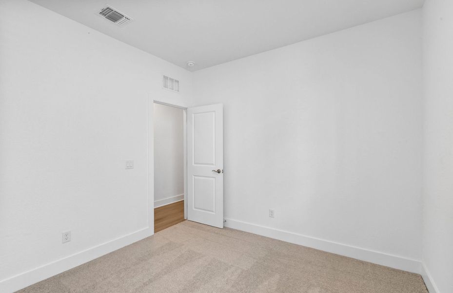 Spacious, unfurnished interior of a new home in Crosswinds, Kyle (Image 22).