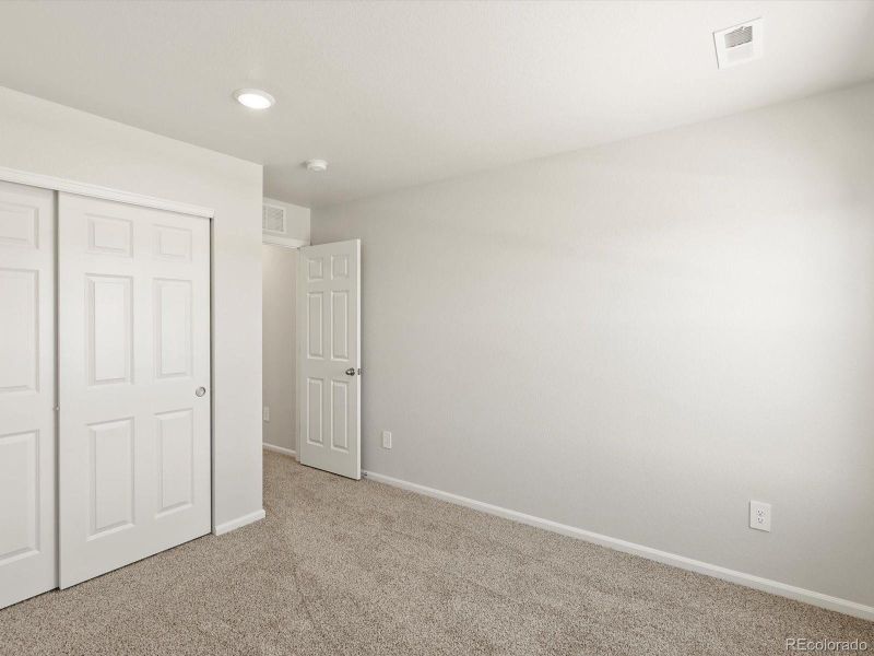 Spacious, unfurnished interior of a new home in Poudre Heights: The Lakes Collection, Windsor (Image 27).