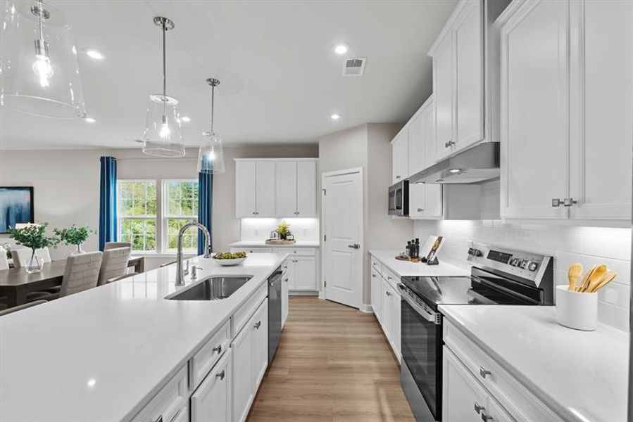 Representative furnished interior of a home built from the Palladio Ranch by Ryan Homes in Ravenfield, Charlotte (Image 14).