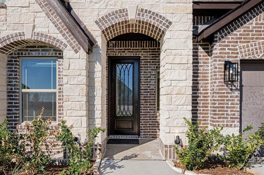 Exterior details and patio area of a home in Coyote Crossing, Godley (Image 3).