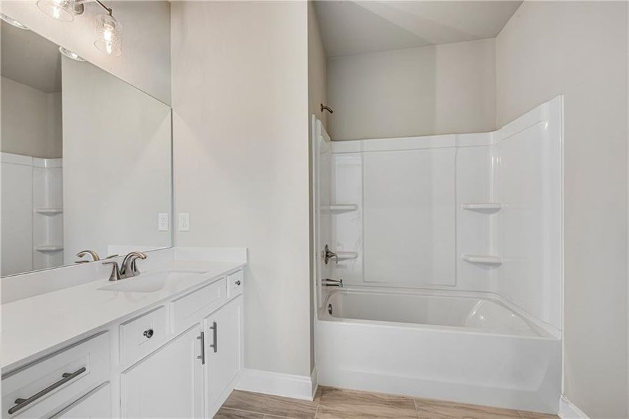 Furnished interior view inside a new home in Hidden Fields, Hoschton (Image 14).