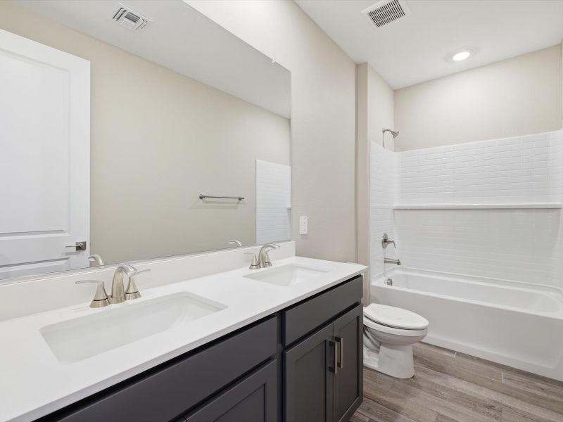 Furnished interior view inside a new home in Entrada Signature Series, Tolleson (Image 8).