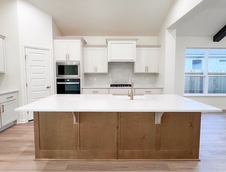 Furnished interior view inside a new home in TerraVista, Victoria (Image 7).