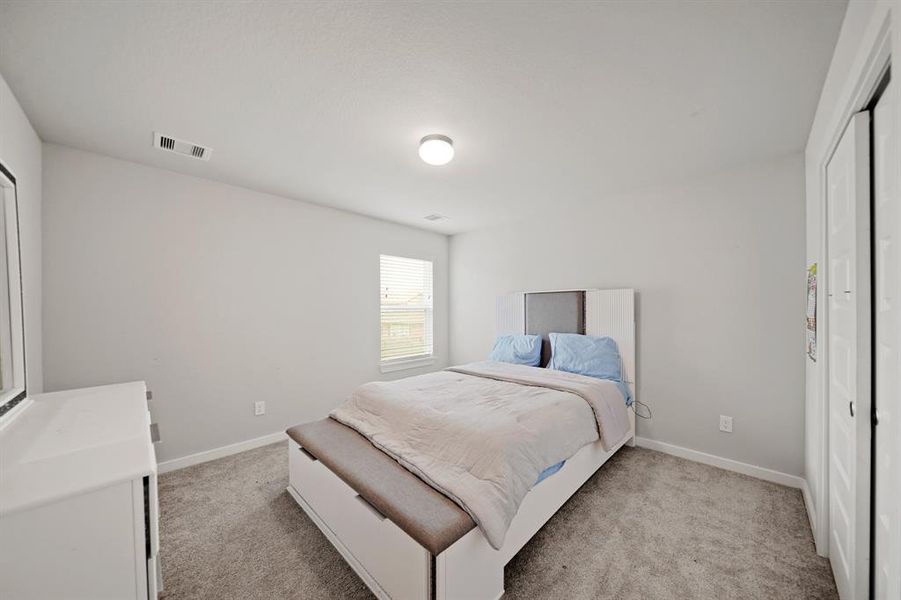 The thoughtfully designed layout of your third bedroom allows for natural light to flood the room, creating a warm and welcoming atmosphere.