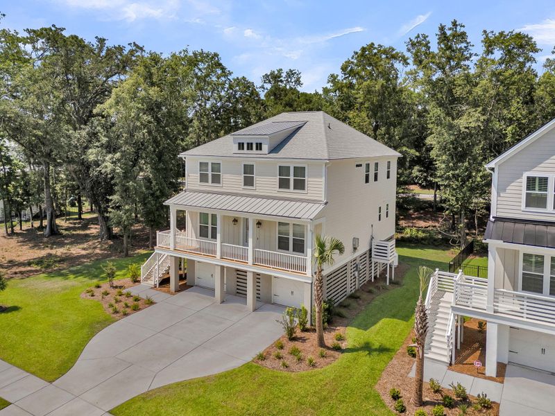 Front exterior of a new home in Fiddler Cove, Mount Pleasant, SC, highlighting curb appeal (Image 26).