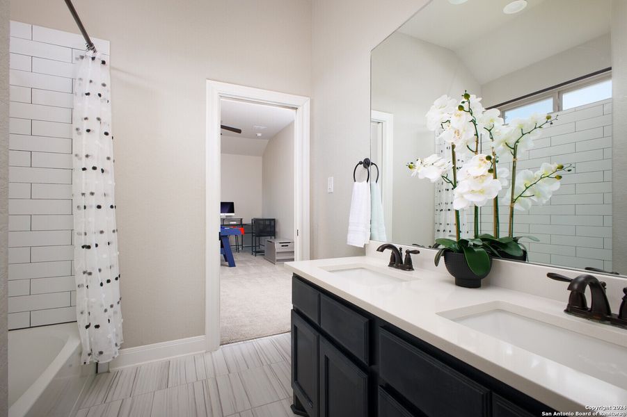 Representative furnished interior of a home built from the The Malta by Whitestone Custom Homes in Johnson Ranch, Bulverde (Image 24).