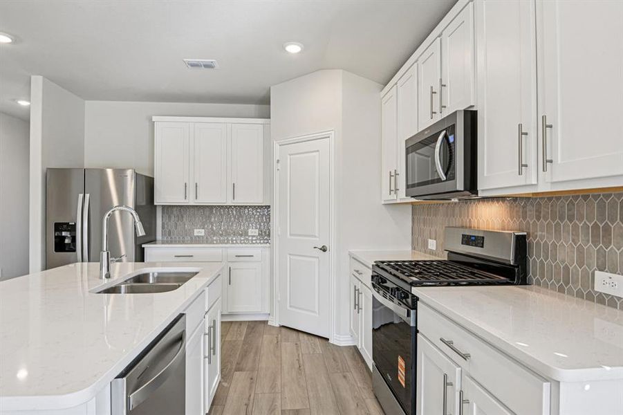 Photo is not of the actual home, but is an inspirational photo of builder’s model home and may depict options, furnishings, and/or decorator features that are not included.