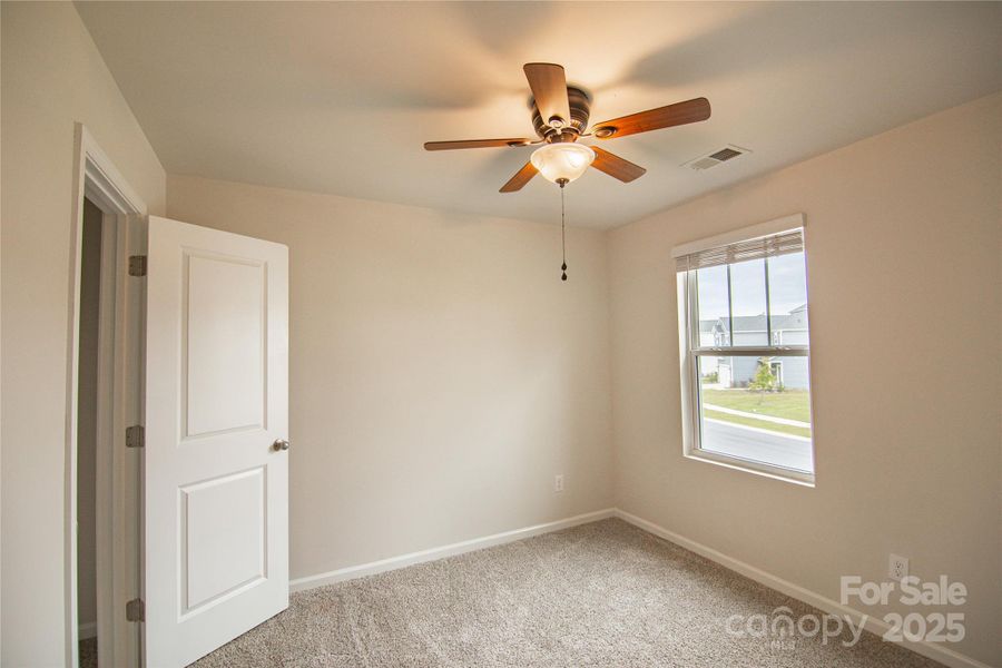Spacious, unfurnished interior of a new home in Belterra, Charlotte (Image 10).