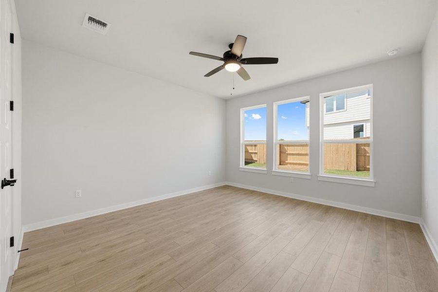 Spacious, unfurnished interior of a new home in Terrace Collection At Turner's Crossing, Buda (Image 30).