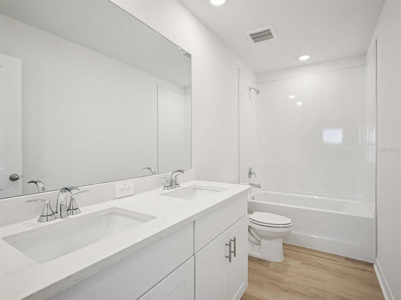 Furnished interior view inside a new home in Oakfield Trails - Premier Series, Parrish (Image 12).