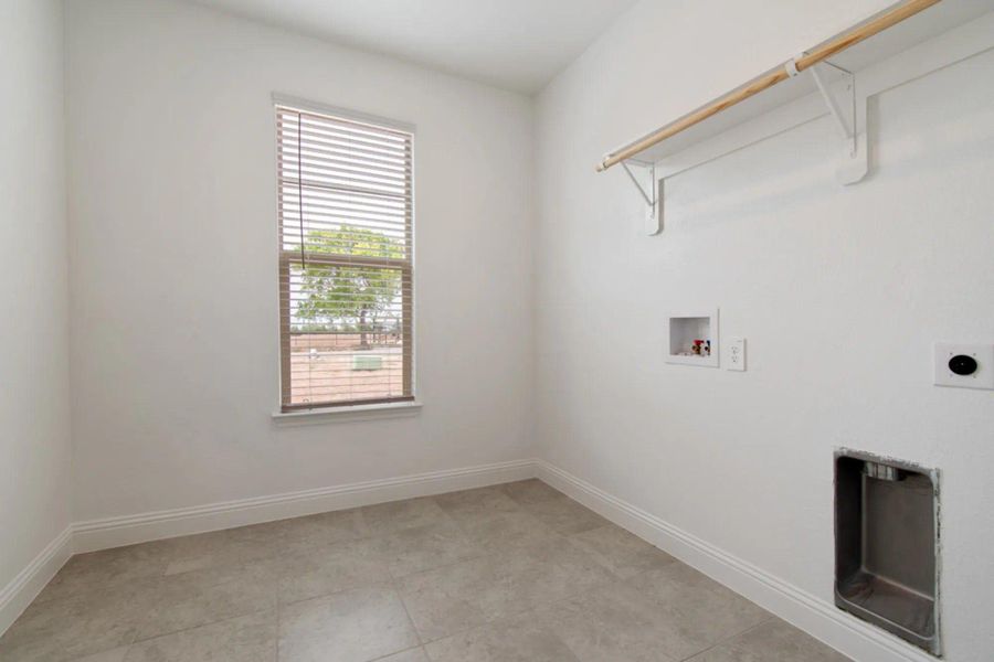 Laundry Room | Concept 2797 at Hidden Creek Estates in Van Alstyne, TX by Landsea Homes