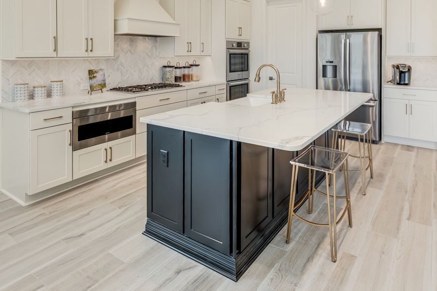 Representative furnished interior of a home built from the Ortega by Riverside Homes in Hidden Creek at SilverLeaf 80' Series, St. Augustine (Image 11).