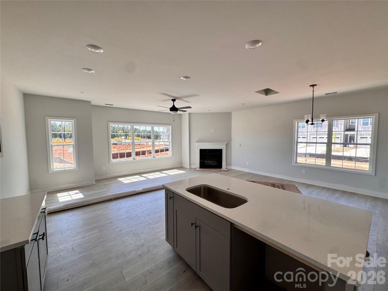 Kitchen looking into living room
