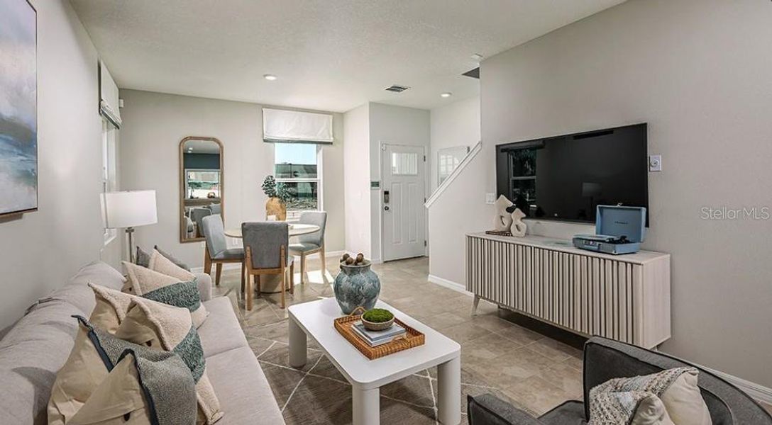 Furnished interior view inside a new home in Westview Community Group Page, Kissimmee (Image 3).