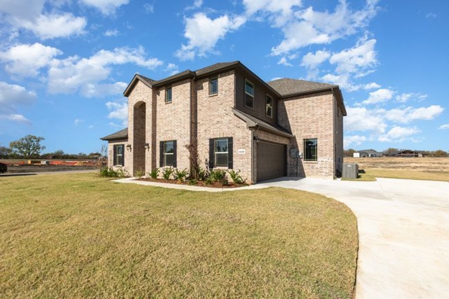 Representative exterior photo of a completed home built from the The Pine by Sumeer Homes in Stone Henge II, Sanger, TX (Image 2). Representative exterior photo of a completed home built from the The Pine by Sumeer Homes in Stone Henge II, Sanger, TX (Image 2).
