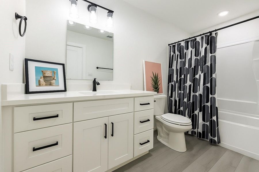 secondary full bathroom located next to the 2nd and 3rd bedroom.