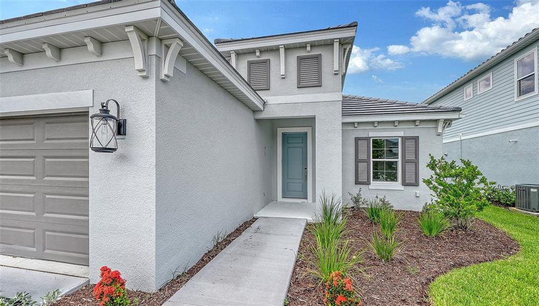 Exterior details and patio area of a home in Grand Park, Sarasota (Image 4). Exterior details and patio area of a home in Grand Park, Sarasota (Image 4).