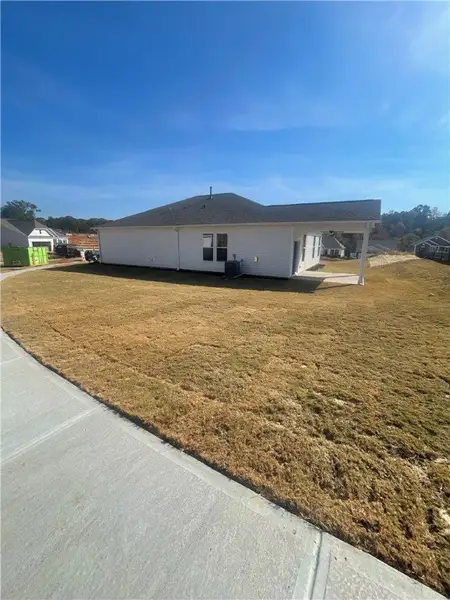 Exterior details and patio area of a home in Springwood Grove, Central (Image 4). Exterior details and patio area of a home in Springwood Grove, Central (Image 4).