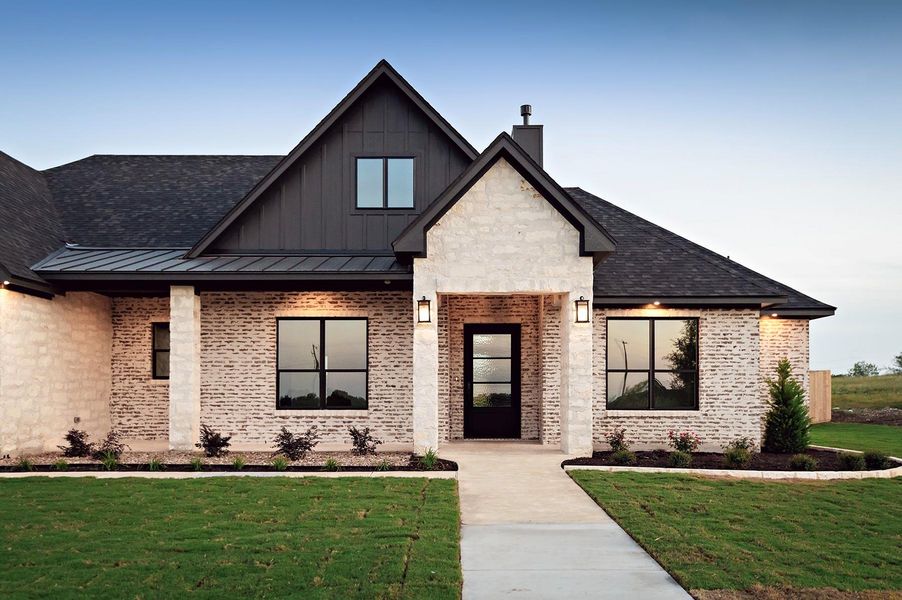 Front exterior of a new home in , Salado, TX, highlighting curb appeal (Image 2). Front exterior of a new home in , Salado, TX, highlighting curb appeal (Image 2).