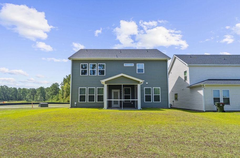 Exterior details and patio area of a home in The Groves of Berkeley, Moncks Corner (Image 28).