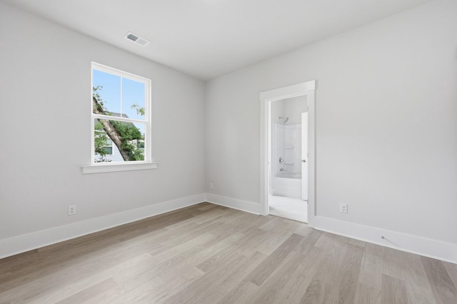 Spacious, unfurnished interior of a new home in Indigo Grove Single Family Homes, Johns Island (Image 28).