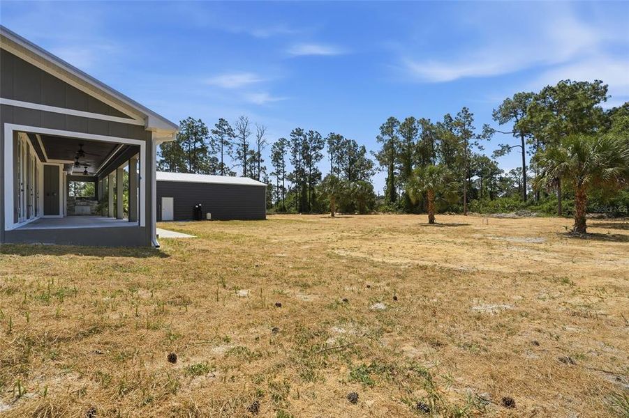 Exterior details and patio area of a home in , Labelle (Image 21).