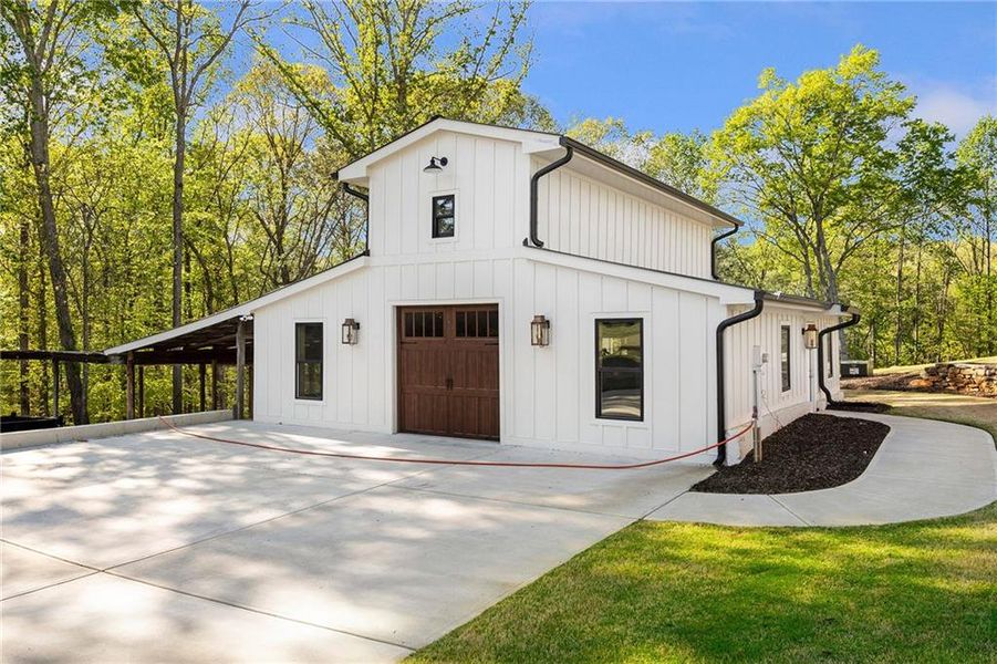 Front exterior of a new home in , Canton, GA, highlighting curb appeal (Image 25).