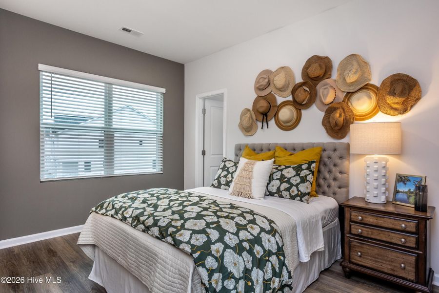 Furnished interior view inside a new home in Coastal Haven Townes, Leland (Image 24).