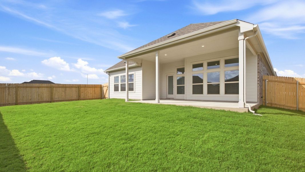 Exterior details and patio area of a home in Carillon, Manor (Image 22).