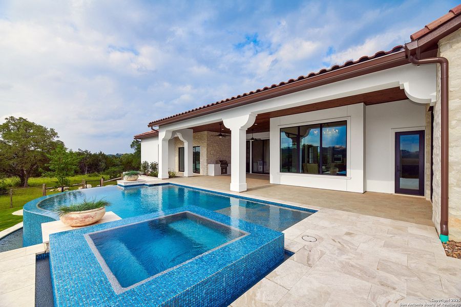 Exterior details and patio area of a home in , Boerne (Image 24).