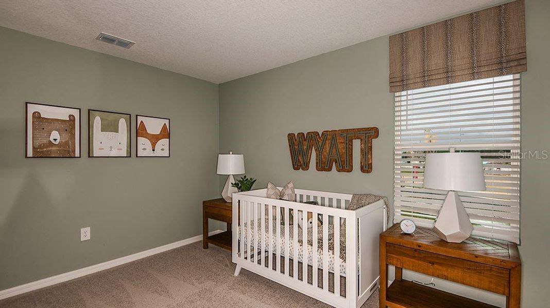 Furnished interior view inside a new home in Marion Creek, Haines City (Image 9).