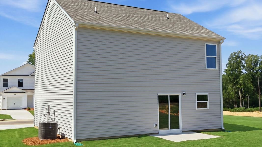 Exterior details and patio area of a home in Hobbs Farm, Ayden (Image 19).