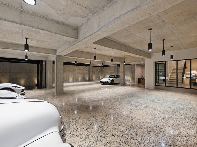 Basement collectors garage with private car elevator