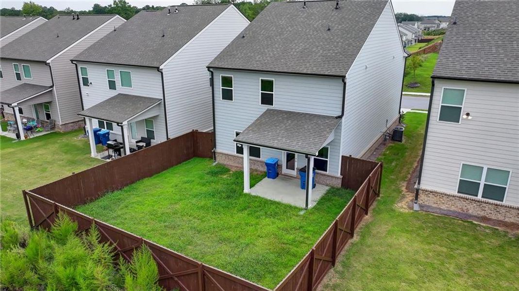 Exterior details and patio area of a home in Westgate Enclave, Loganville (Image 4).
