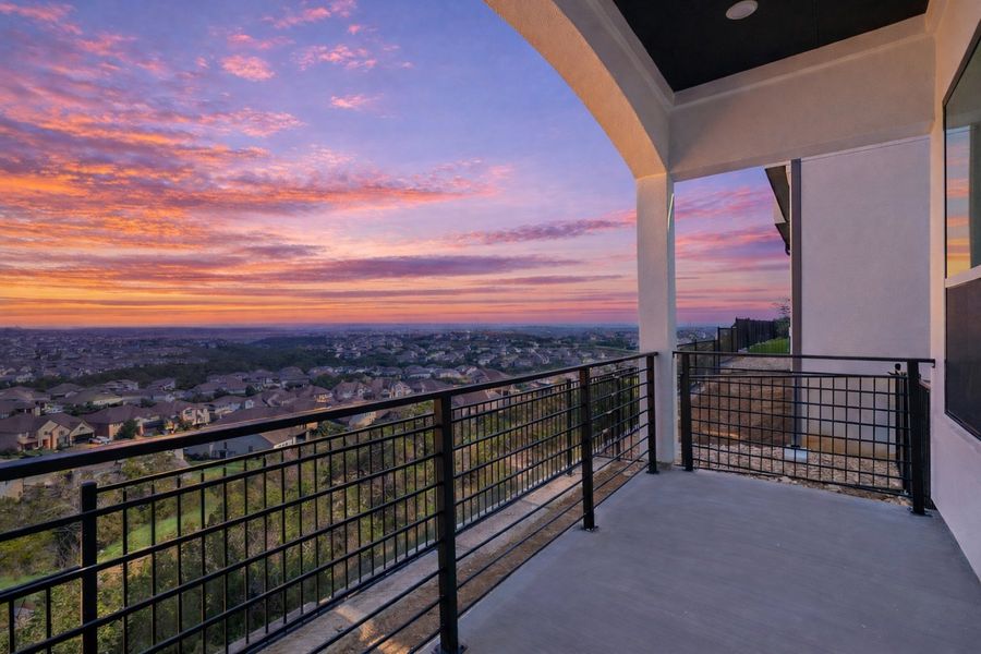 Exterior details and patio area of a home in The Point at Rough Hollow, Lakeway (Image 3).