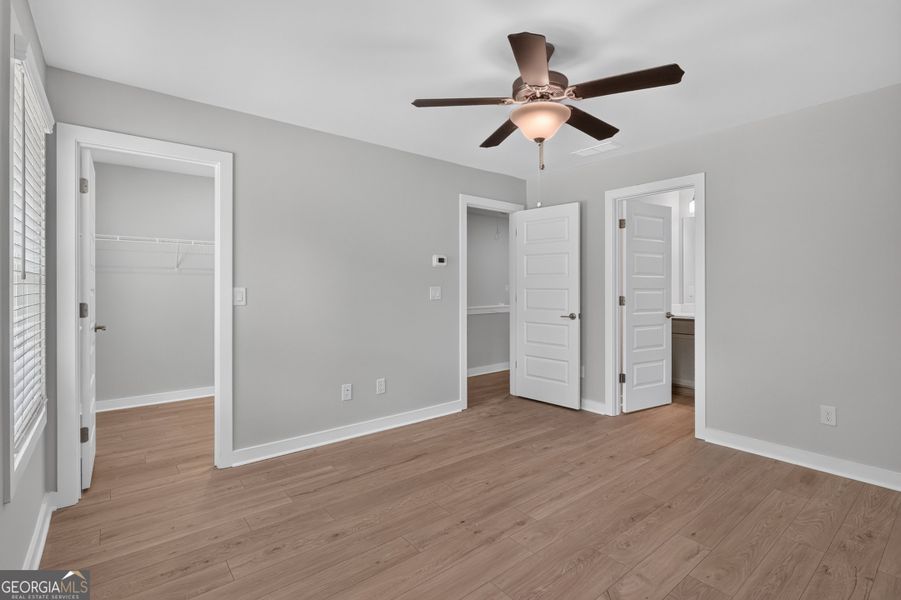 Spacious, unfurnished interior of a new home in The Cottages at East Lanier, Fayetteville (Image 13).