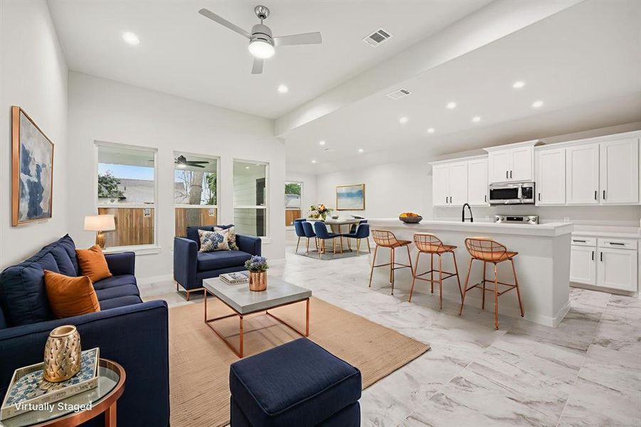 Virtually Staged Livingroom and Kitchen open concept. Virtually Staged Livingroom and Kitchen open concept.