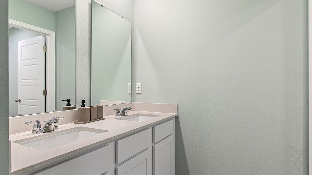Representative furnished interior of a home built from the HAYDEN II by D.R. Horton in Copes Landing, Jacksonville (Image 29).