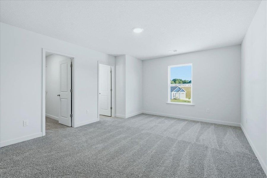Spacious, unfurnished interior of a new home in Stones Throw, Inman (Image 22).