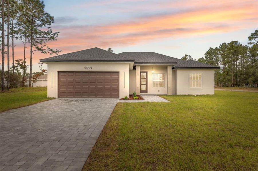 Front exterior of a new home in , Ocala, FL, highlighting curb appeal (Image 24).