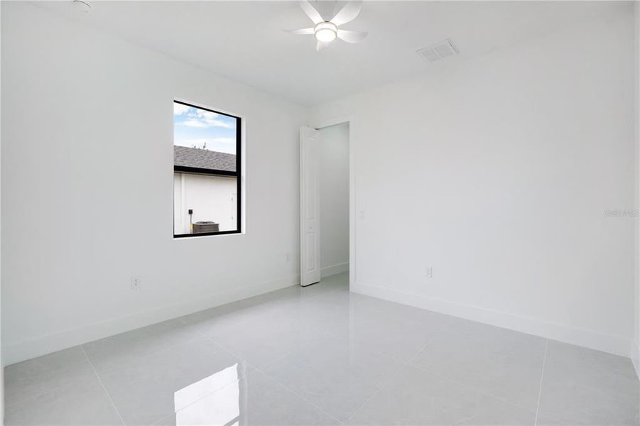 Spacious, unfurnished interior of a new home in , Port Charlotte (Image 36).
