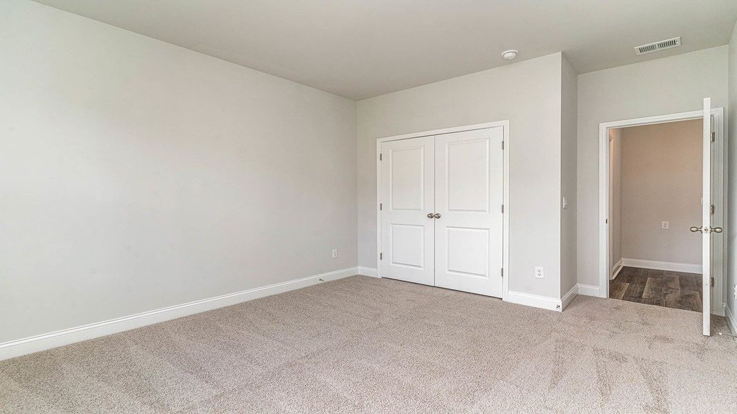 Representative unfurnished interior of a home built from the Forrester by D.R. Horton in Old Chapin Reserve, Lexington (Image 21).