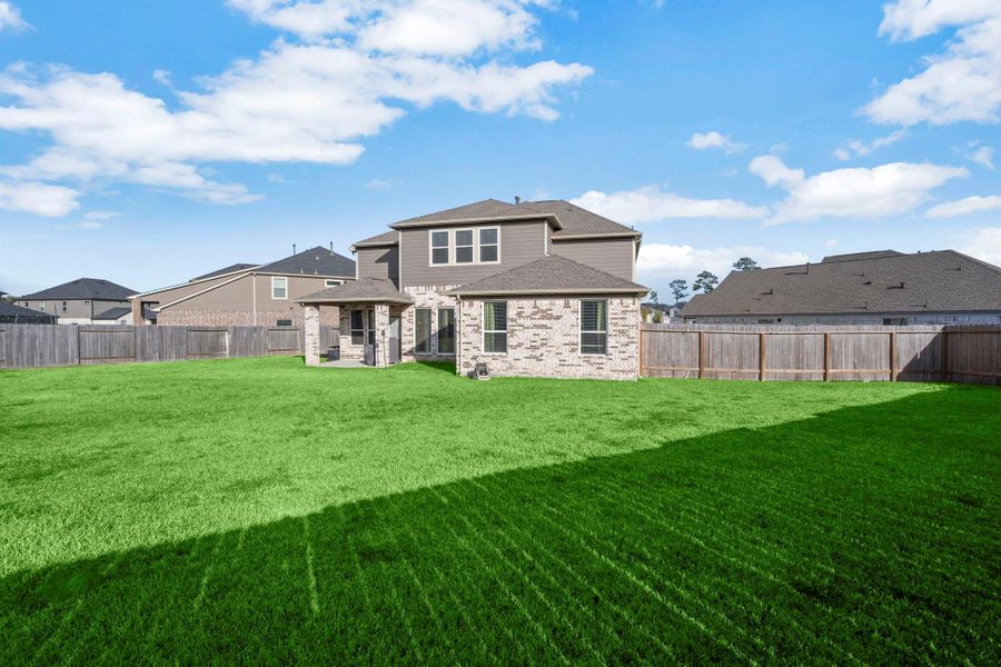 Exterior details and patio area of a home in Bradbury Forest, Spring (Image 3).